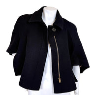 Chloé black wool cropped cape jacket from Fall 2013 shown open with gold-tone asymmetric zipper and cape sleeves