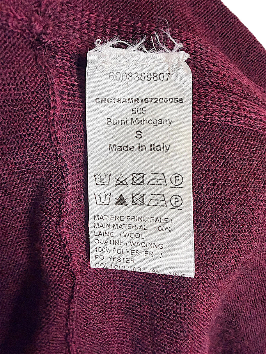 Chloé wool sweater dress interior care and composition label showing size S, Burnt Mahogany color 605, 100% wool main material and Made in Italy.