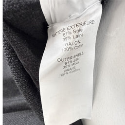 Chloé black dress composition label showing 61 percent silk 39 percent wool and 100 percent cotton trim