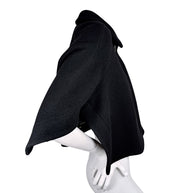 Side view of Chloé black virgin wool cropped cape jacket FR 36 showing flared sculptural sleeve silhouette