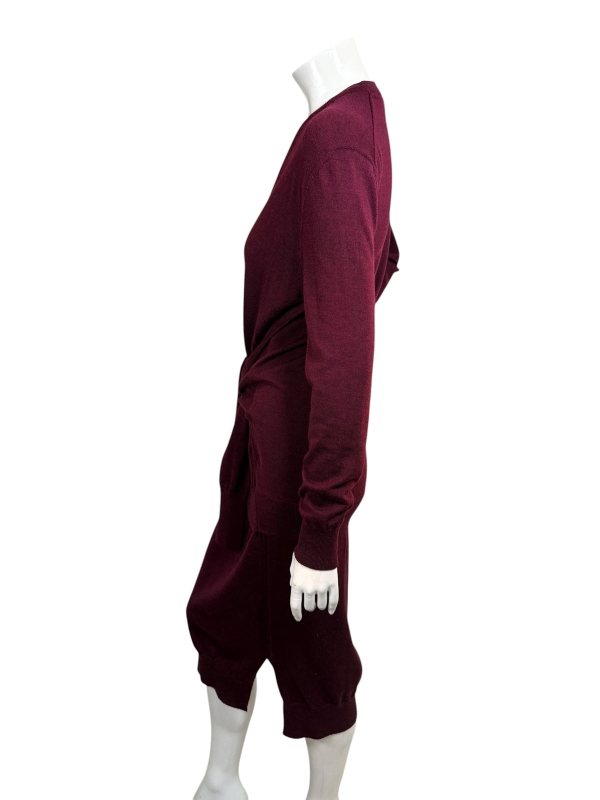 Opposite side profile of Chloé Burnt Mahogany wool knit midi dress featuring long ribbed cuffs, integrated tie waist and layered sweater construction.