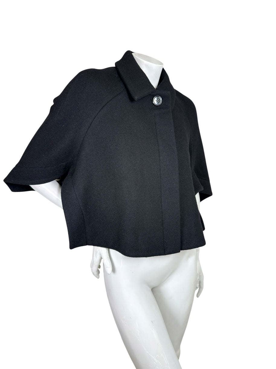Three-quarter view of Chloé Fall 2013 black wool cape jacket FR 36 with sculptural cropped cape sleeves