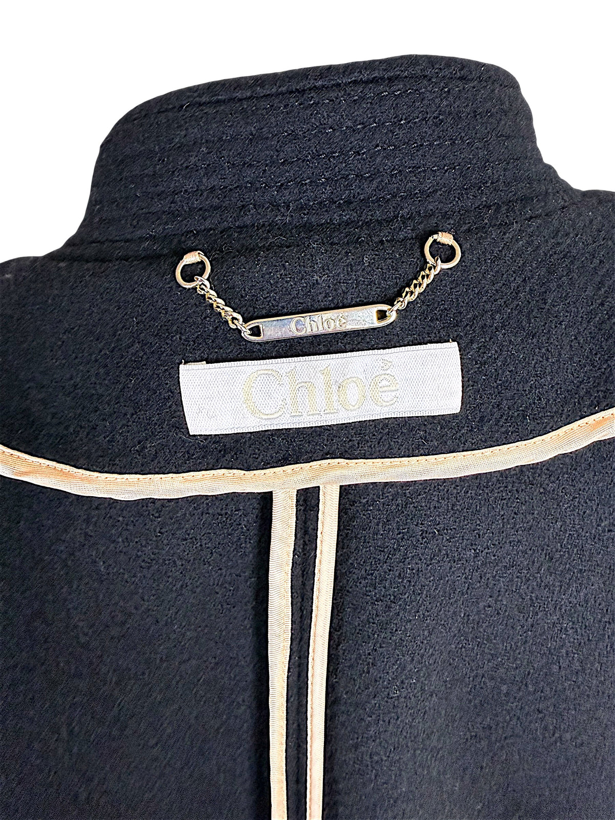 Chloé designer label and gold-tone chain plaque inside Fall 2013 black wool cropped cape jacket