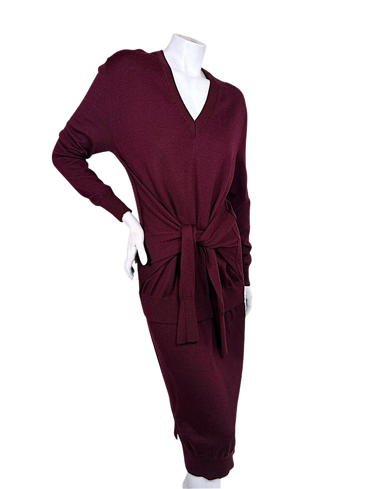 Three-quarter front view of Chloé Fall 2019 Burnt Mahogany wool midi sweater dress with long sleeves, draped knit construction and tie-front waist.