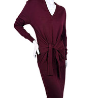 Three-quarter front view of Chloé Fall 2019 Burnt Mahogany wool midi sweater dress with long sleeves, draped knit construction and tie-front waist.