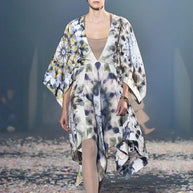 Christian Dior Spring 2019 runway look featuring kaleidoscope print silk dress