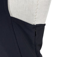 Close-up of Courrèges Fall 2024 Ready-to-Wear Look 23 black hooded mini dress showing loose threading beneath the arm near the concealed side zipper, photographed for condition reference.