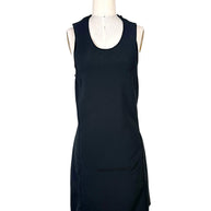 Front view of Courrèges Fall 2024 Look 23 black Oblique Space mini dress with scoop neckline, sleeveless silhouette and front welt pocket detail, FR 36.