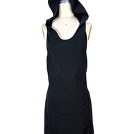 Courrèges Fall 2024 Look 23 black Oblique Space mini dress shown with its oversized sculptural hood raised, front view on a US size 2 dress form.