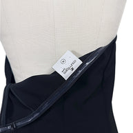 Authentic Courrèges Paris designer label showing French size 36 inside Fall 2024 Look 23 Oblique Space black hooded mini dress, with interior construction visible.