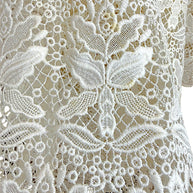 Emilio Pucci lace detail floral knit ivory fabric with light soiling condition close up