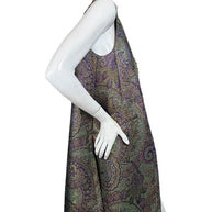 Side profile of Etro women's longline paisley jacquard vest showing sleeveless silhouette, metallic woven fabric and elongated hem.