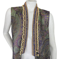 Close-up front view of Etro metallic paisley vest featuring faux pearl embellishments, coral-toned beads and purple decorative trim.