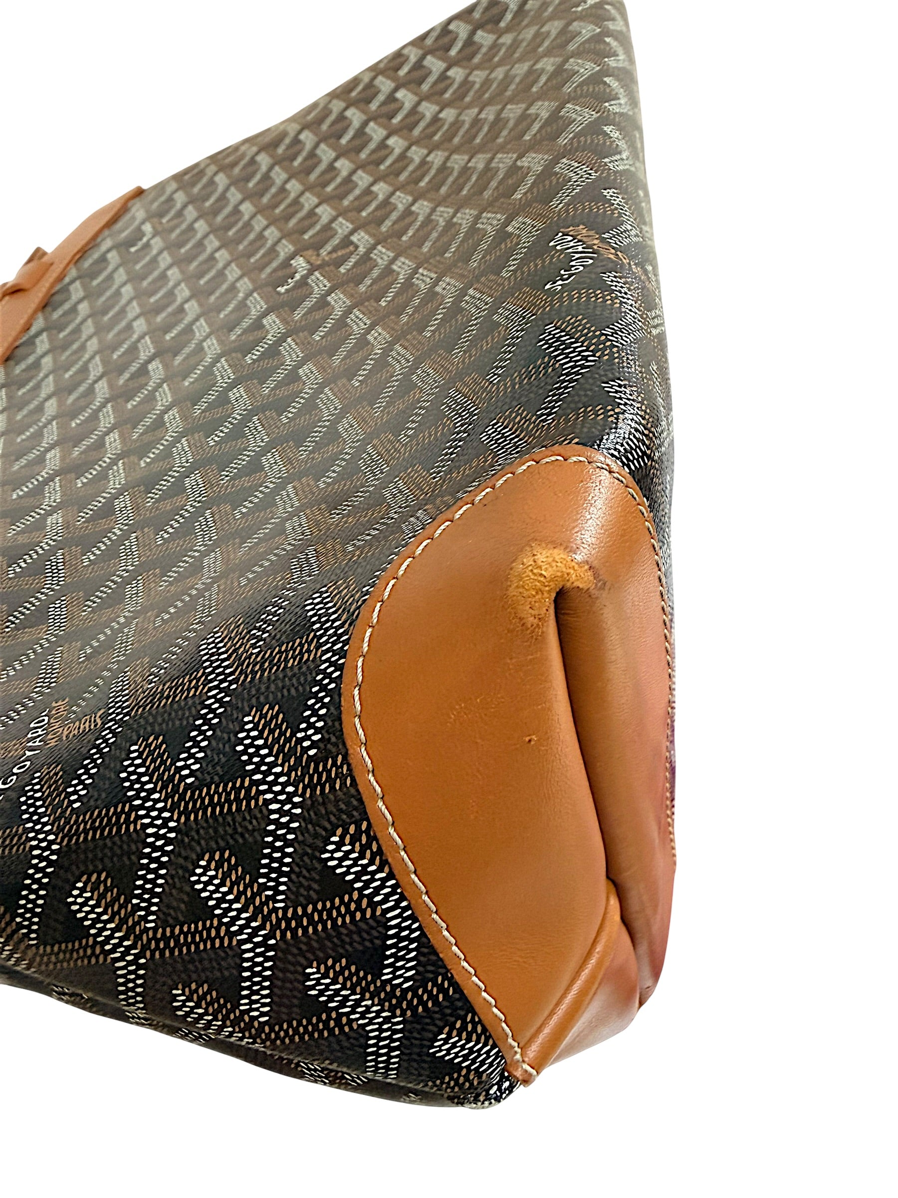 Close-up corner detail of authentic Goyard Artois PM tote showing light wear consistent with use.