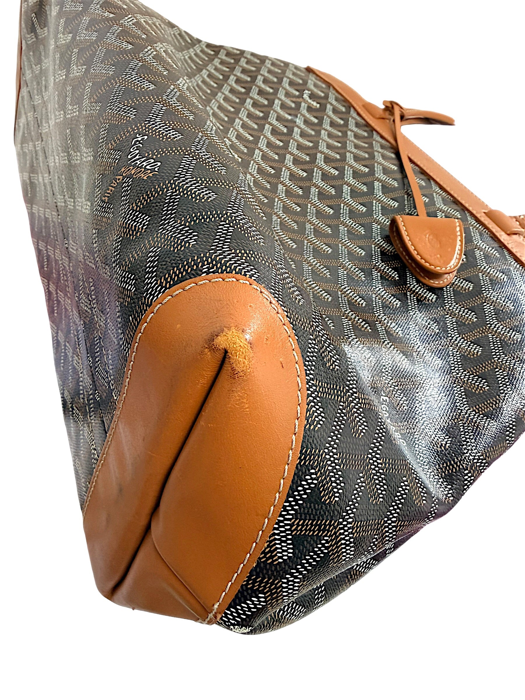 Detailed corner leather condition of authentic Goyard Artois PM handbag showing normal wear from use.