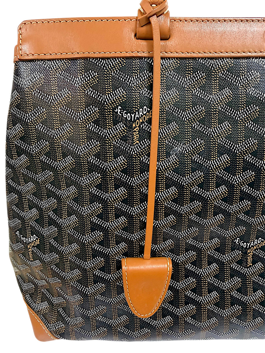 Front exterior view of authentic Goyard Artois PM with leather clochette and signature Goyardine pattern.