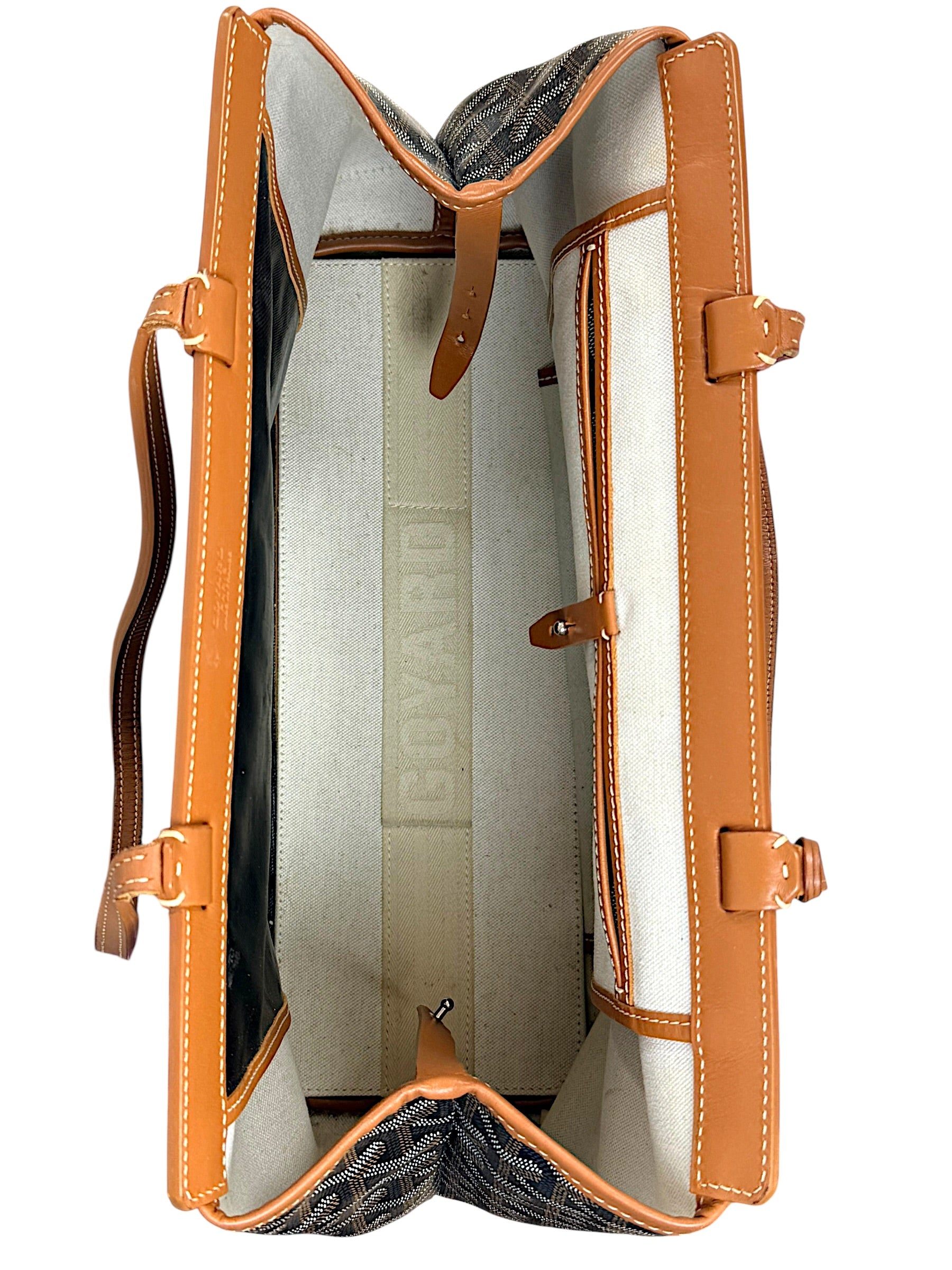 Interior overview of authentic Goyard Artois PM tote showing clean canvas lining and organizational compartments.