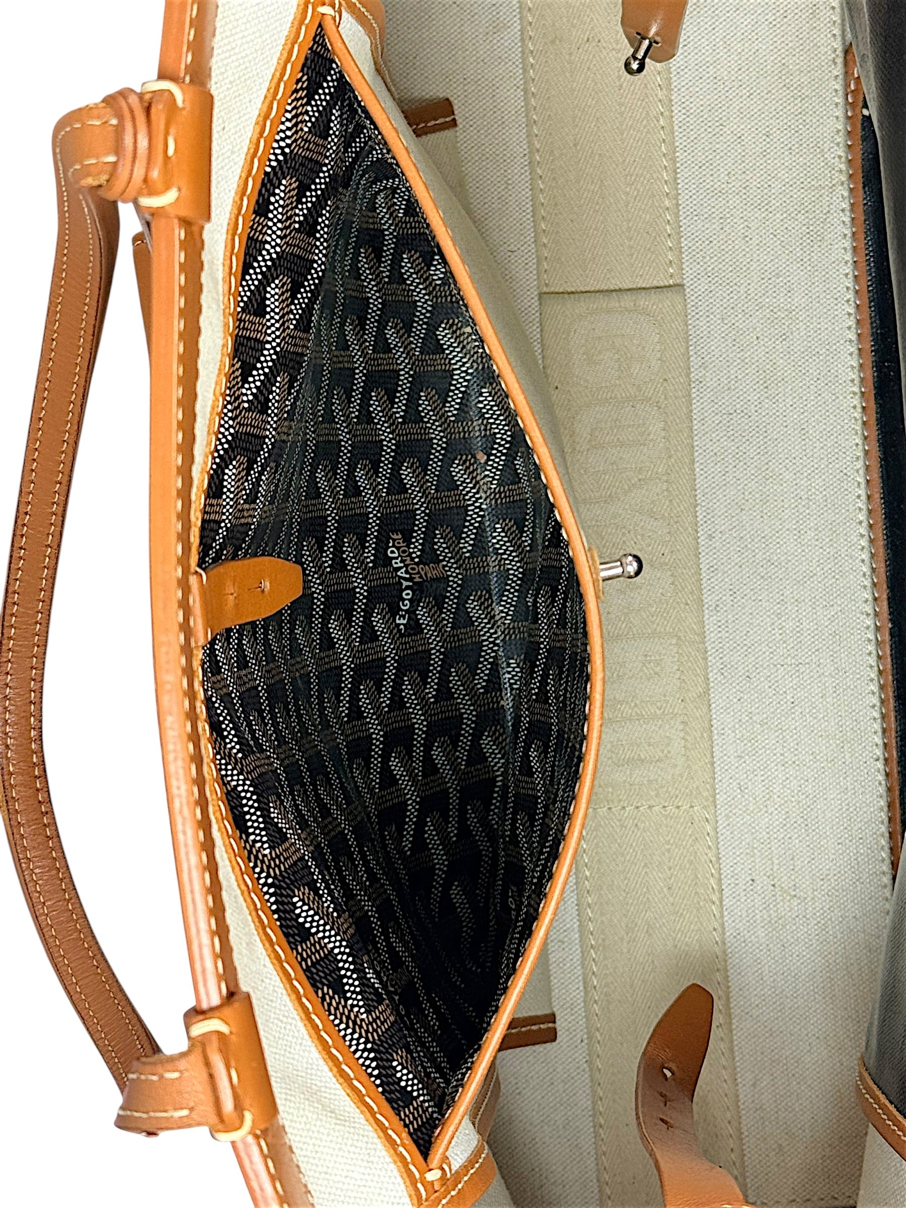 Interior organizational pocket detail of authentic Goyard Artois PM tote with clean canvas lining.