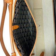 Interior organizational pocket detail of authentic Goyard Artois PM tote with clean canvas lining.