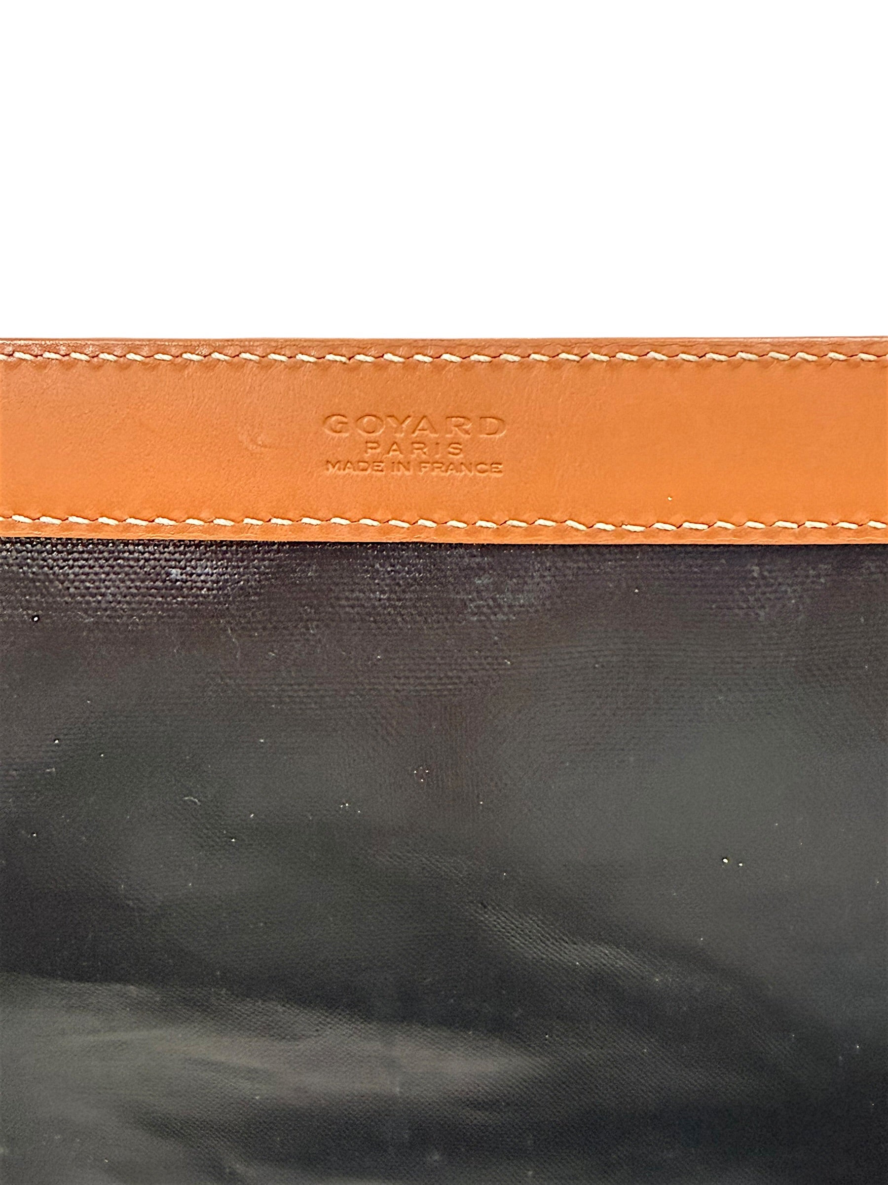 Close-up detail of authentic Goyard Artois PM embossed Goyard Paris Made in France leather stamp.