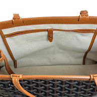 Open top view of authentic Goyard Artois PM tote showing leather trim and structured silhouette.