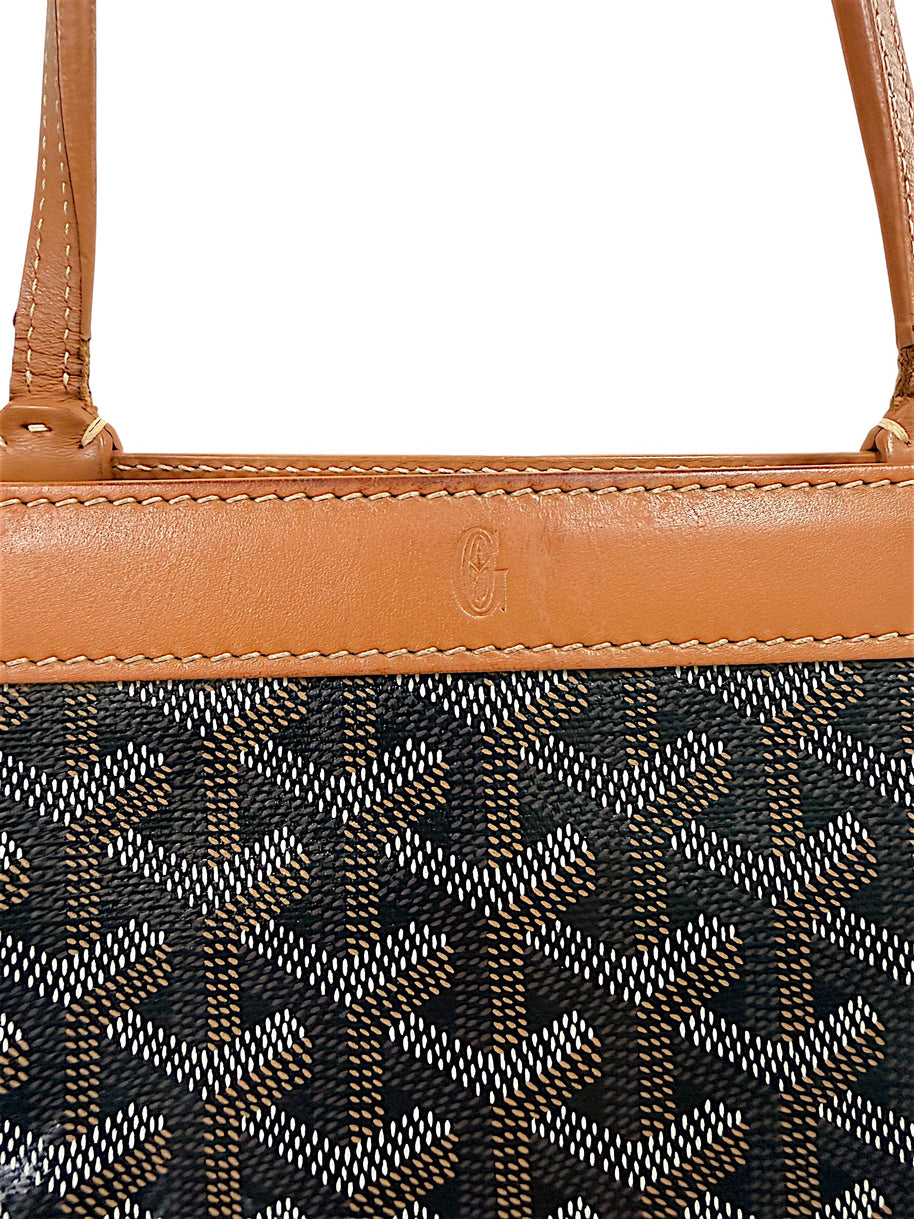 Close-up leather top trim detail of authentic Goyard Artois PM tote showing craftsmanship and condition.