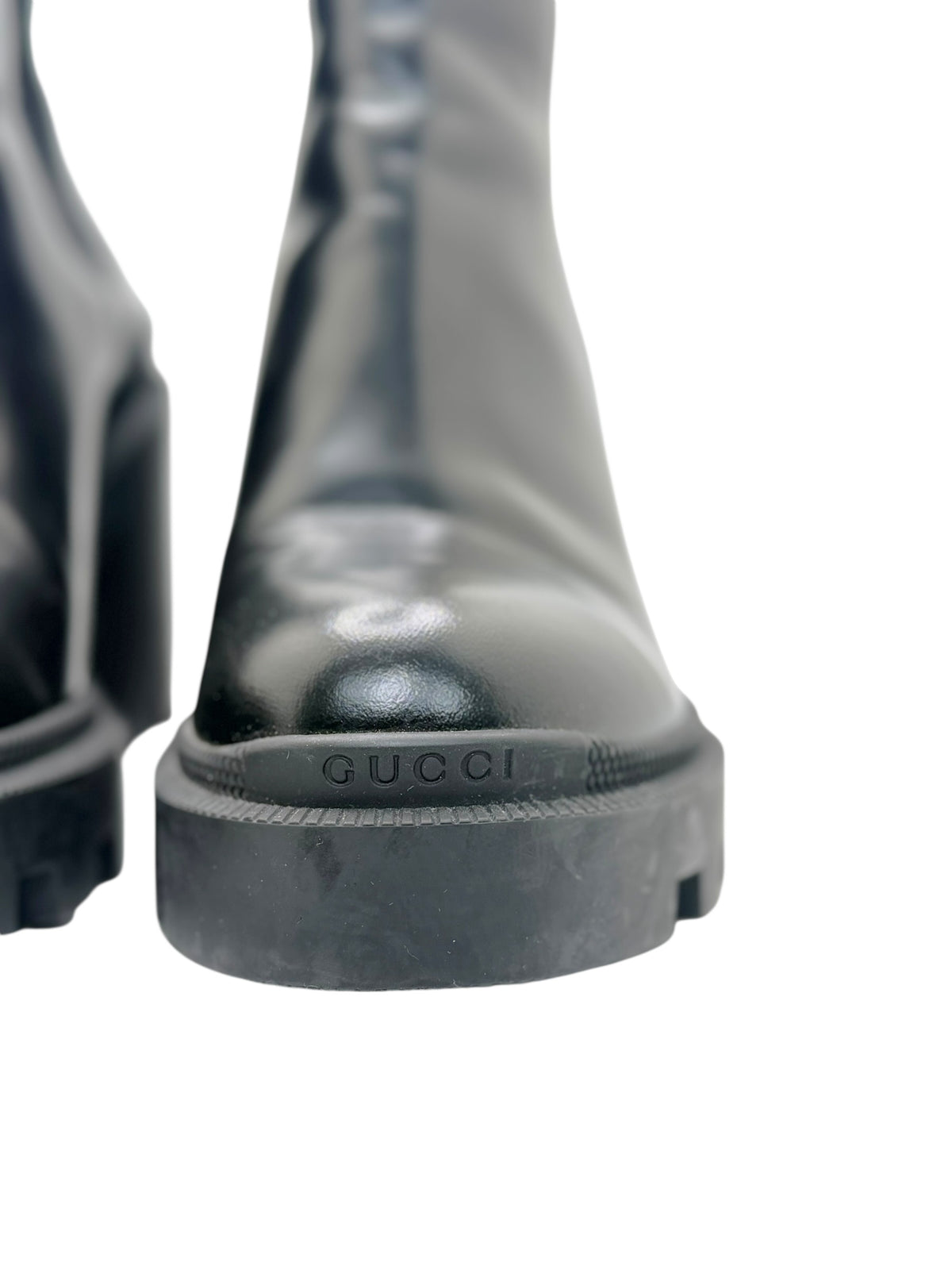 Gucci black leather Chelsea boots front detail showing toes and lug soles