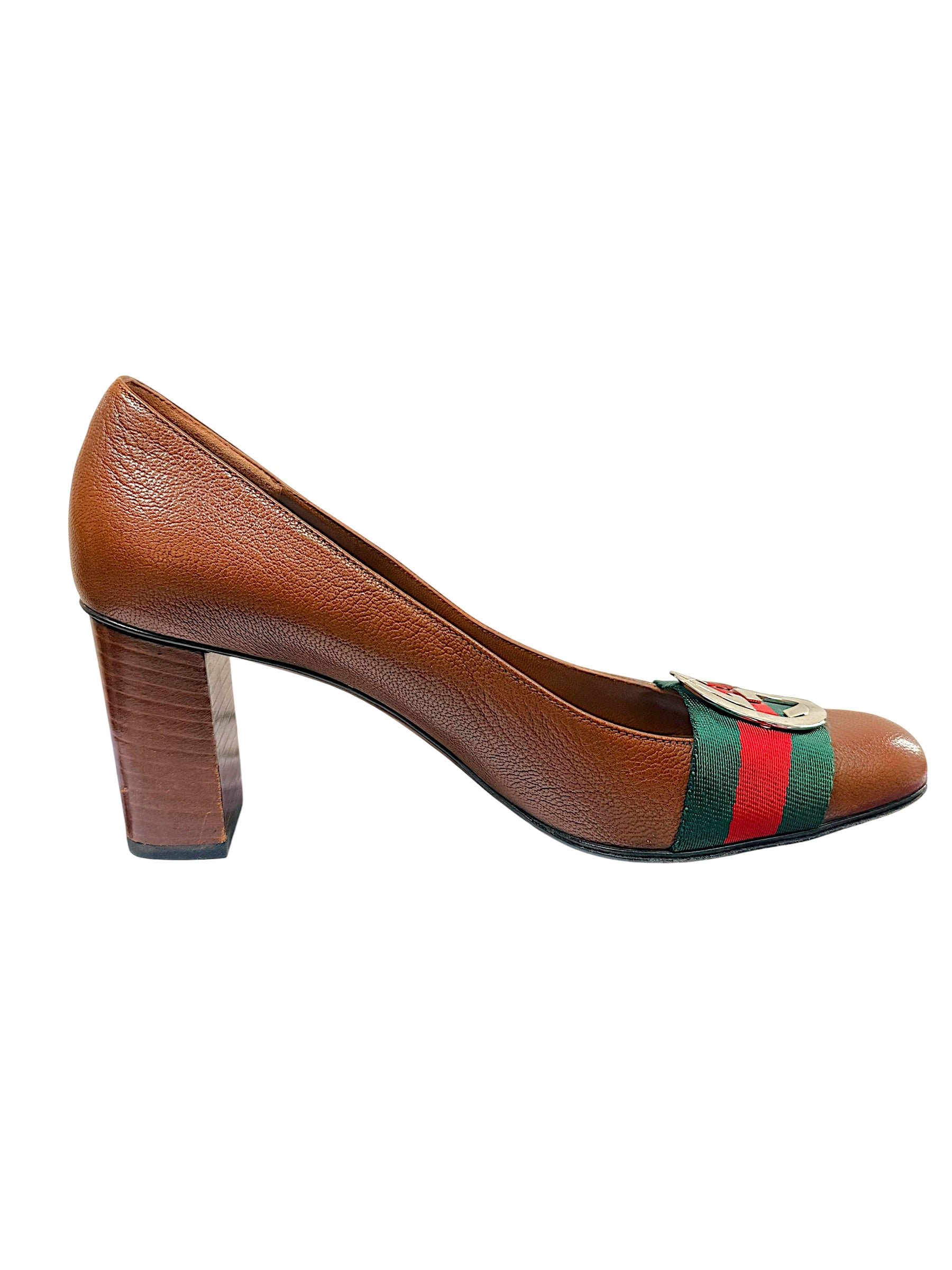 Full right profile of Gucci brown leather pumps with signature green and red Web stripe and GG hardware.