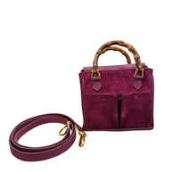 Gucci mini bamboo handle magenta suede top handle crossbody bag with detachable strap