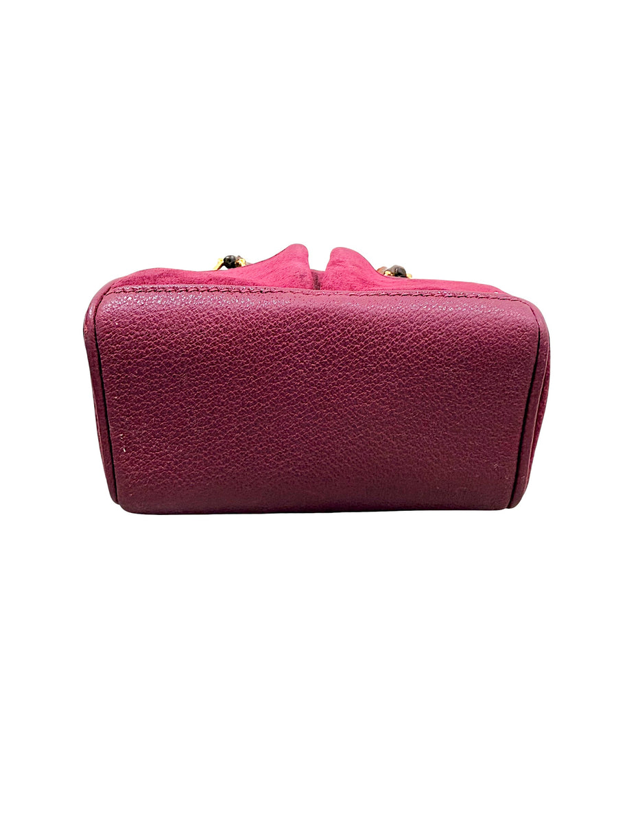 Bottom base view of Gucci magenta suede bamboo handbag