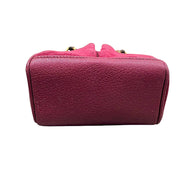 Bottom base view of Gucci magenta suede bamboo handbag