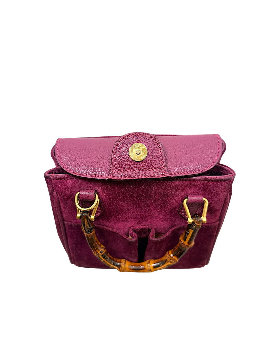 Gucci suede bamboo bag with flap closure open showing interior