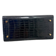 Bottom base view of Hermès Birkin 30 black crocodile handbag with feet
