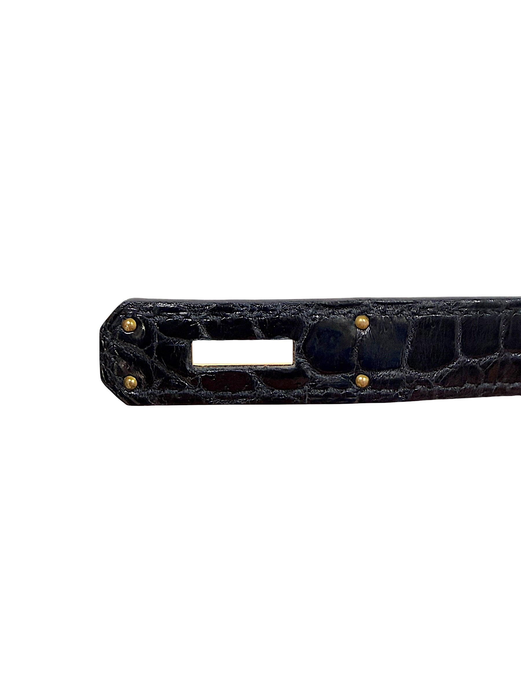 Detail of Hermès Birkin black crocodile sangles strap and hardware