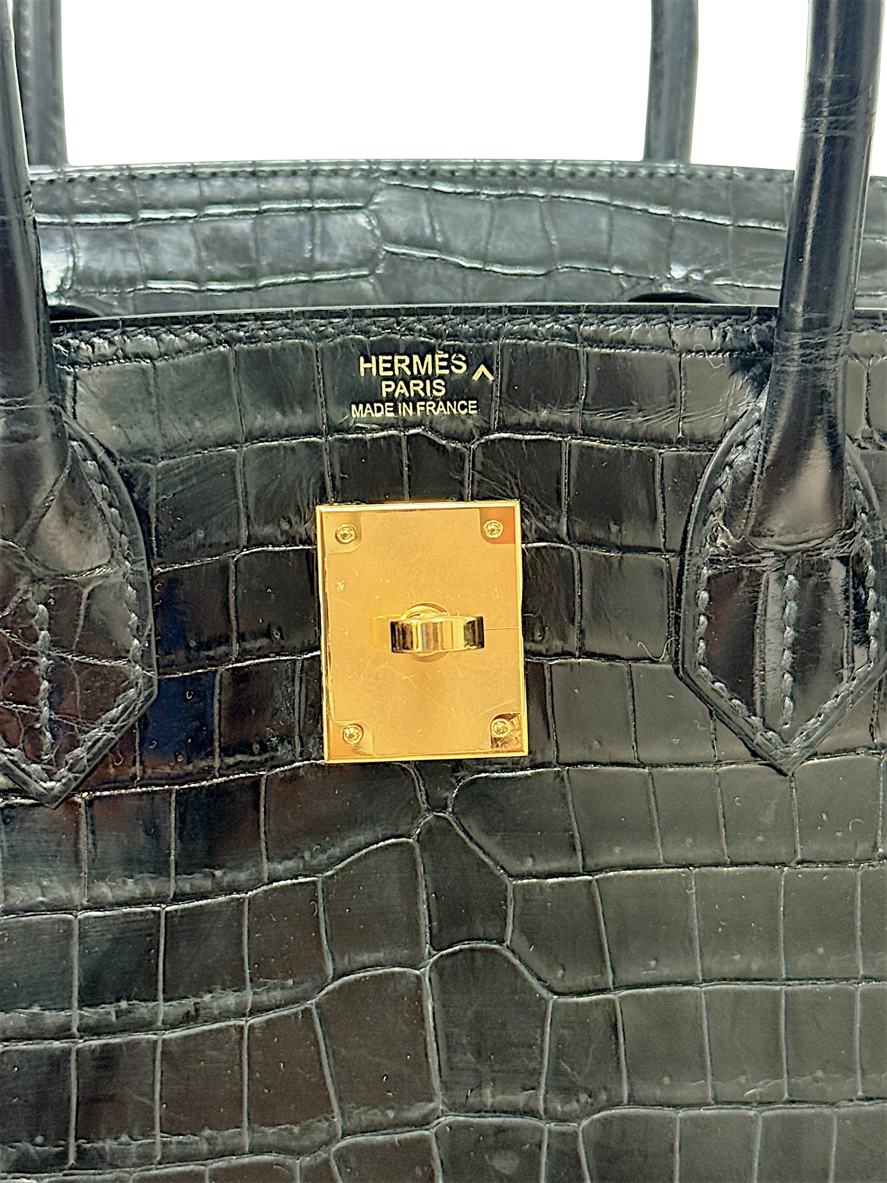 Hermès Paris Made in France embossing on black crocodile leather interior