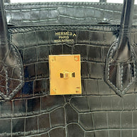 Hermès Paris Made in France embossing on black crocodile leather interior