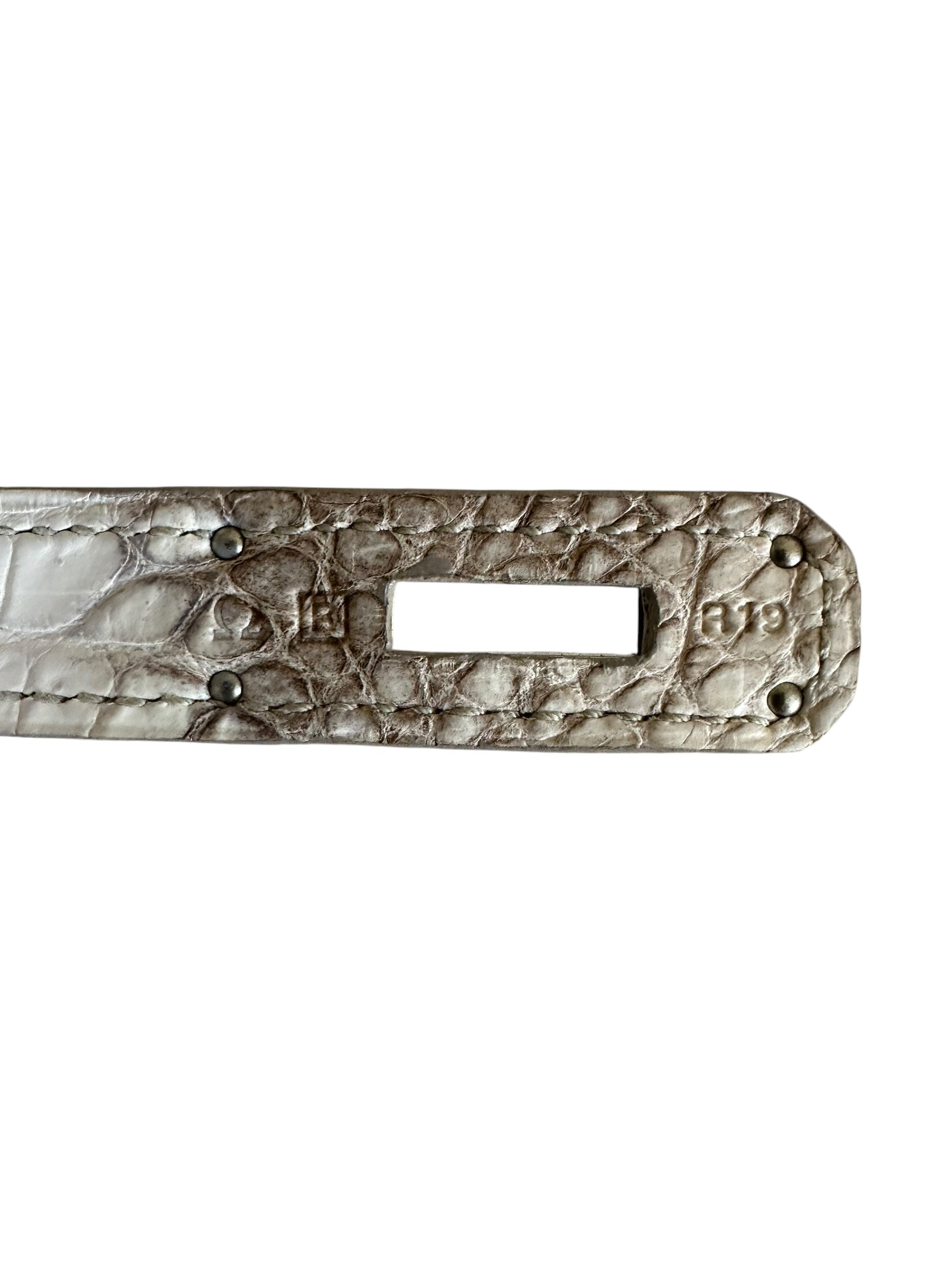 Hermès Himalaya Birkin 30 blind stamp and date code detail on crocodile leather strap.