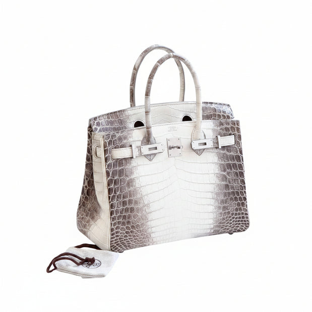 Three-quarter front view of Hermès Himalaya Birkin 30 in matte Niloticus crocodile with palladium hardware and original accessories.