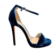 Side profile of Jimmy Choo Misty 120 teal velvet sandal showing its high stiletto heel, subtle front platform and adjustable ankle buckle.