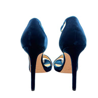 Rear view of Jimmy Choo Misty 120 teal velvet sandals featuring sculpted heel counters and slender velvet-covered stiletto heels.
