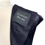 Close-up image of Lanvin Hiver 2005 label attached to black satin archival designer dress.