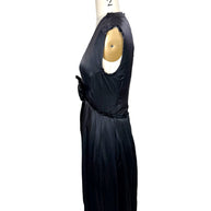 Right side profile of Lanvin Hiver 2005 black satin dress with pleated skirt and elegant minimalist silhouette.