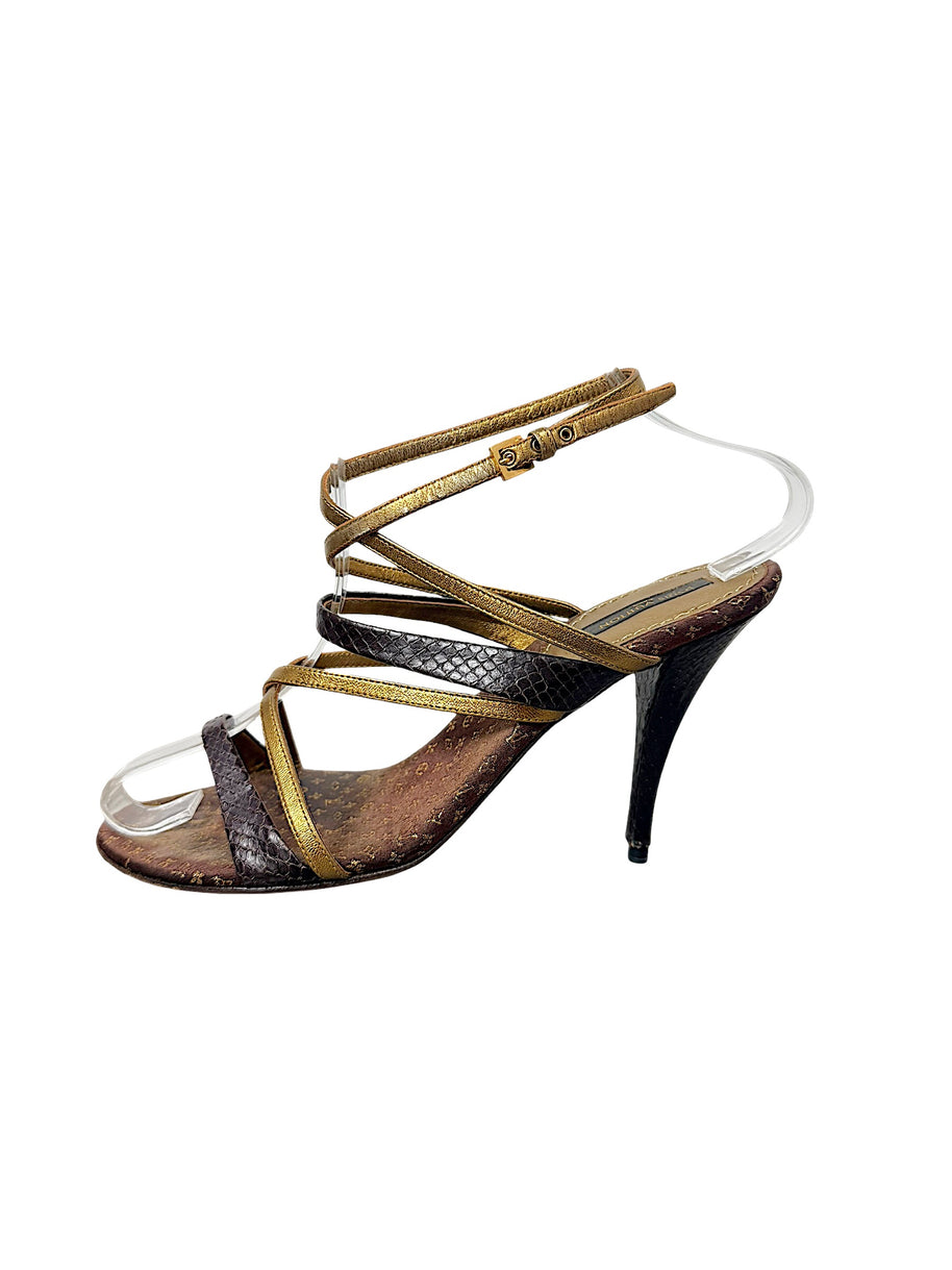 Side detail of Louis Vuitton Monogram evening sandal showing metallic gold straps and dark brown textured detailing