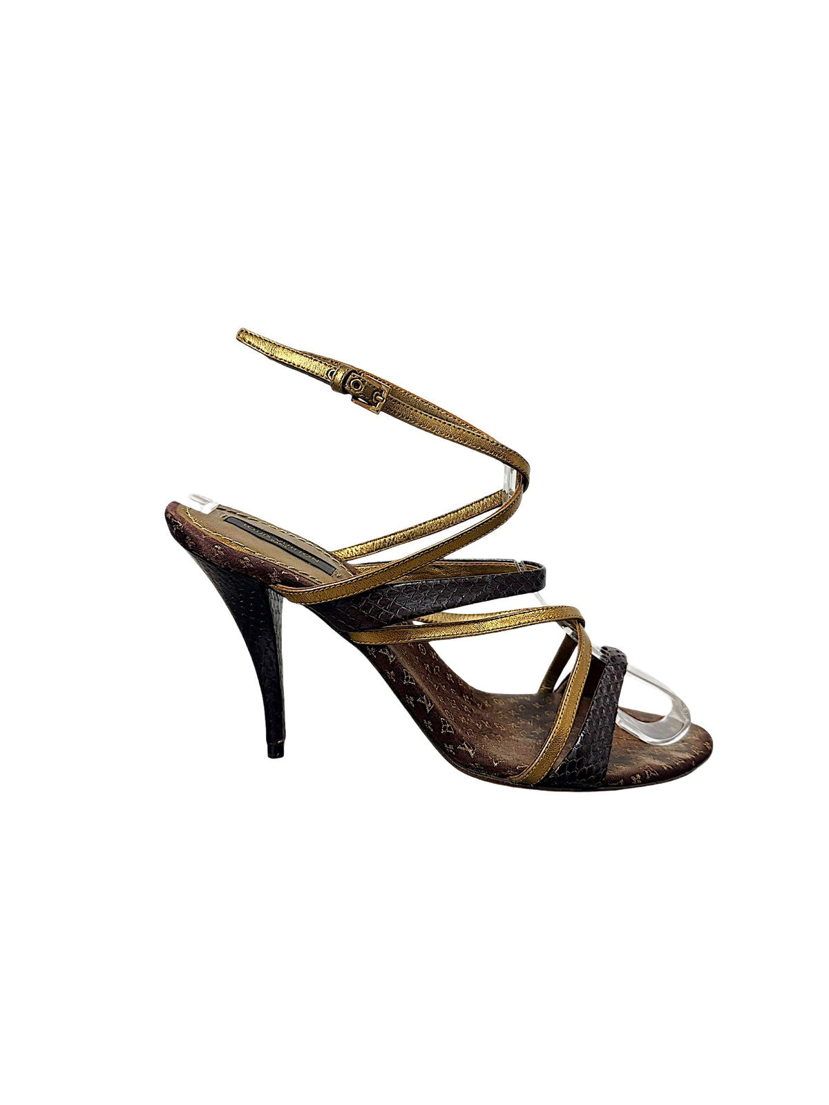 Side view of Louis Vuitton vintage strappy heel showing metallic gold wraparound ankle strap and stiletto heel