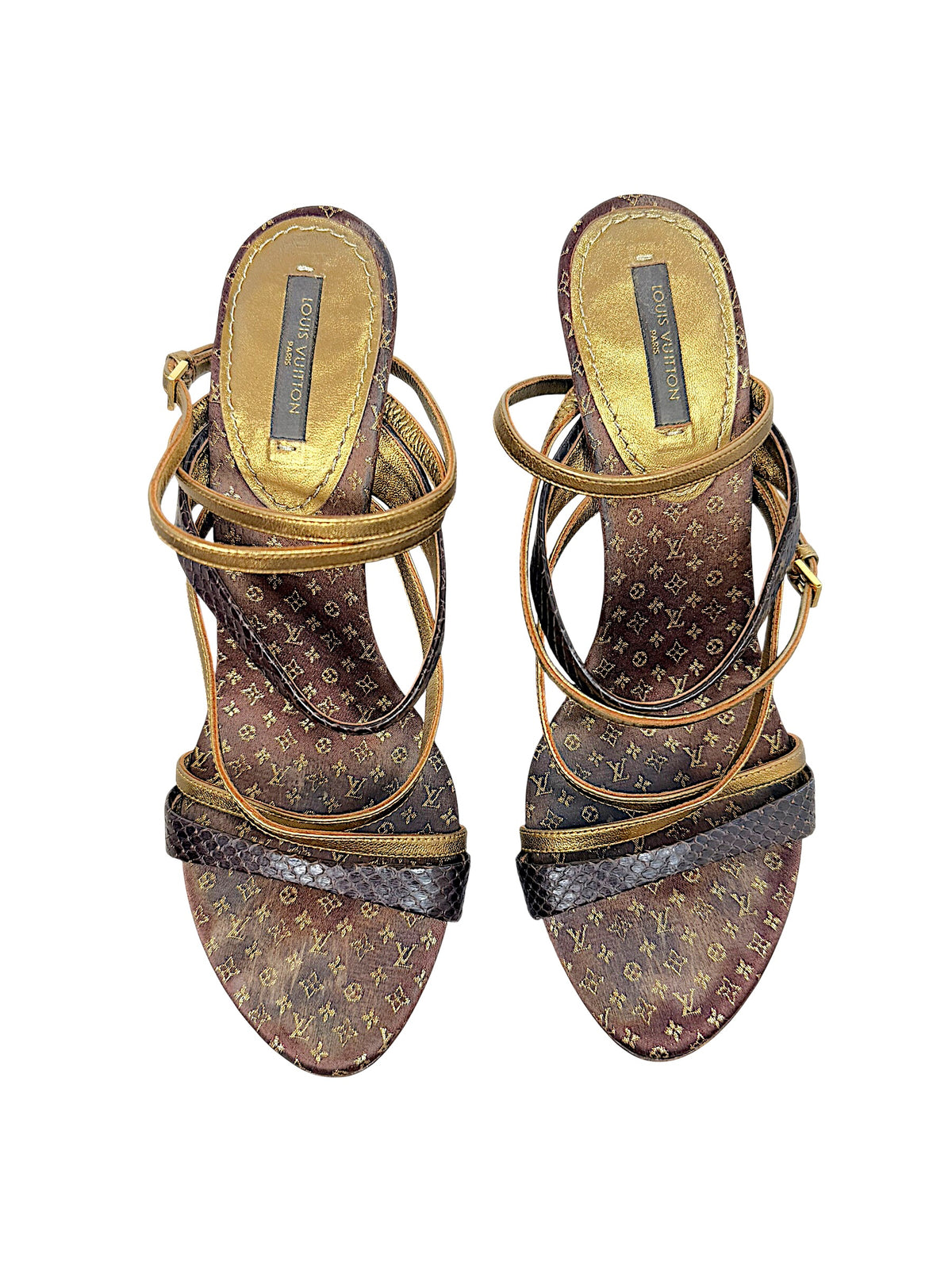 Close top view of Louis Vuitton vintage sandals showing brown and gold Monogram footbeds, metallic gold straps and dark brown textured straps