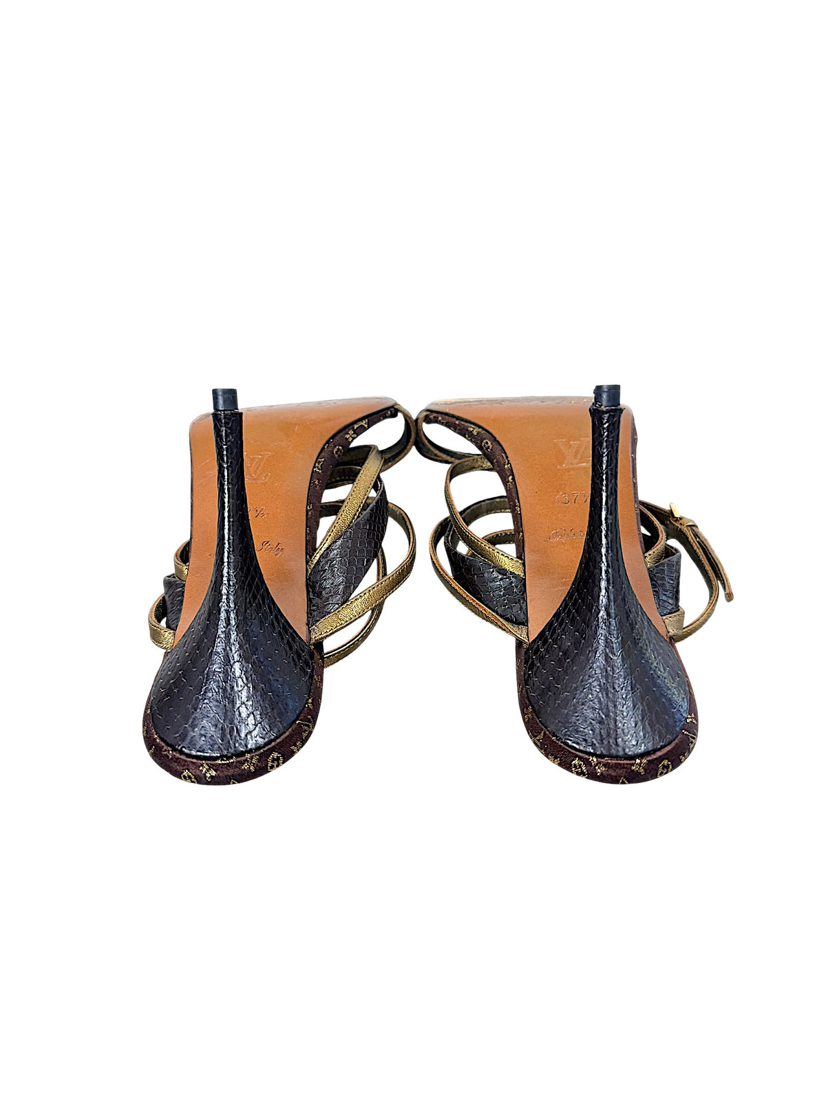 Underside and heel view of Louis Vuitton vintage Monogram sandals showing dark textured stiletto heels and leather soles