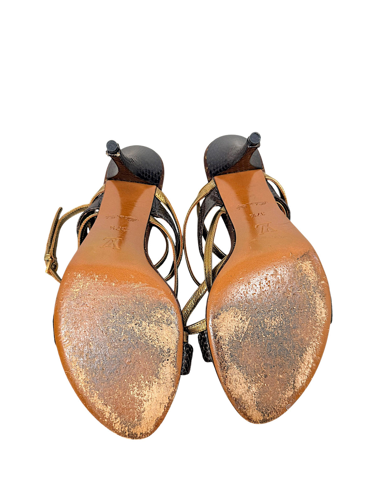Louis Vuitton sandal leather soles showing LV stamp, size 37.5, Made in Italy markings and visible sole wear