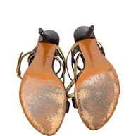 Louis Vuitton sandal leather soles showing LV stamp, size 37.5, Made in Italy markings and visible sole wear