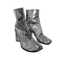 Maison Margiela cracked metallic silver leather Tabi ankle boots size 38 three-quarter view showing split toes and block heels