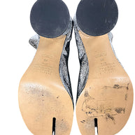 Leather soles of Maison Margiela silver Tabi ankle boots size 38 showing wear consistent with previous use